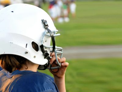 A man wearing a football helmet.