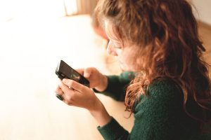 A woman on her cellphone.
