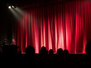 People sitting in an auditorium.