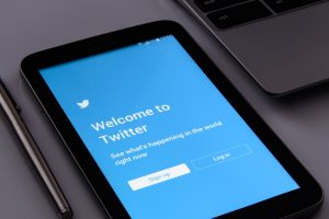 A tablet with the Twitter welcome message on its screen.