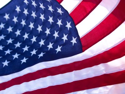 Close-up of the United States flag showing the stars and stripes design.