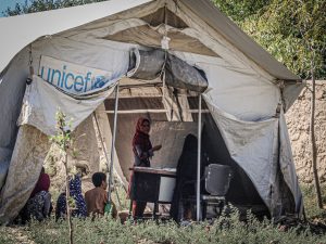 Children attend school in a UNICEF refugee camp in Afghanistan