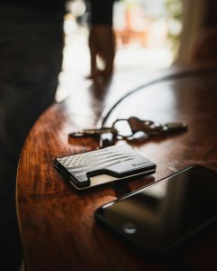 recording-device-on-table A wooden table with a recording device on top.