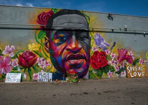A photo of a mural of George Floyd