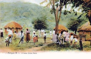 An old postcard depicting a group of Antiguans playing a cricket match