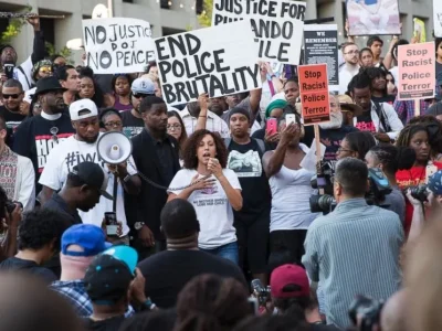 People rally against police violence in Dallas on Thursday night, shortly before an attack that killed five police officers and wounded seven.
