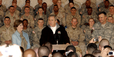President George W. Bush, the First Lady, Laura Bush, and Lt. Gen. Karl Eikenberry, Combined Forces Command — Afghanistan commander, pay a surprise visit to troops here March 1. (U.S. Army photo/Pfc. Brian Schroeder) Public Domain Copyright Free
