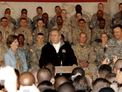 President George W. Bush, the First Lady, Laura Bush, and Lt. Gen. Karl Eikenberry, Combined Forces Command — Afghanistan commander, pay a surprise visit to troops here March 1. (U.S. Army photo/Pfc. Brian Schroeder) Public Domain Copyright Free